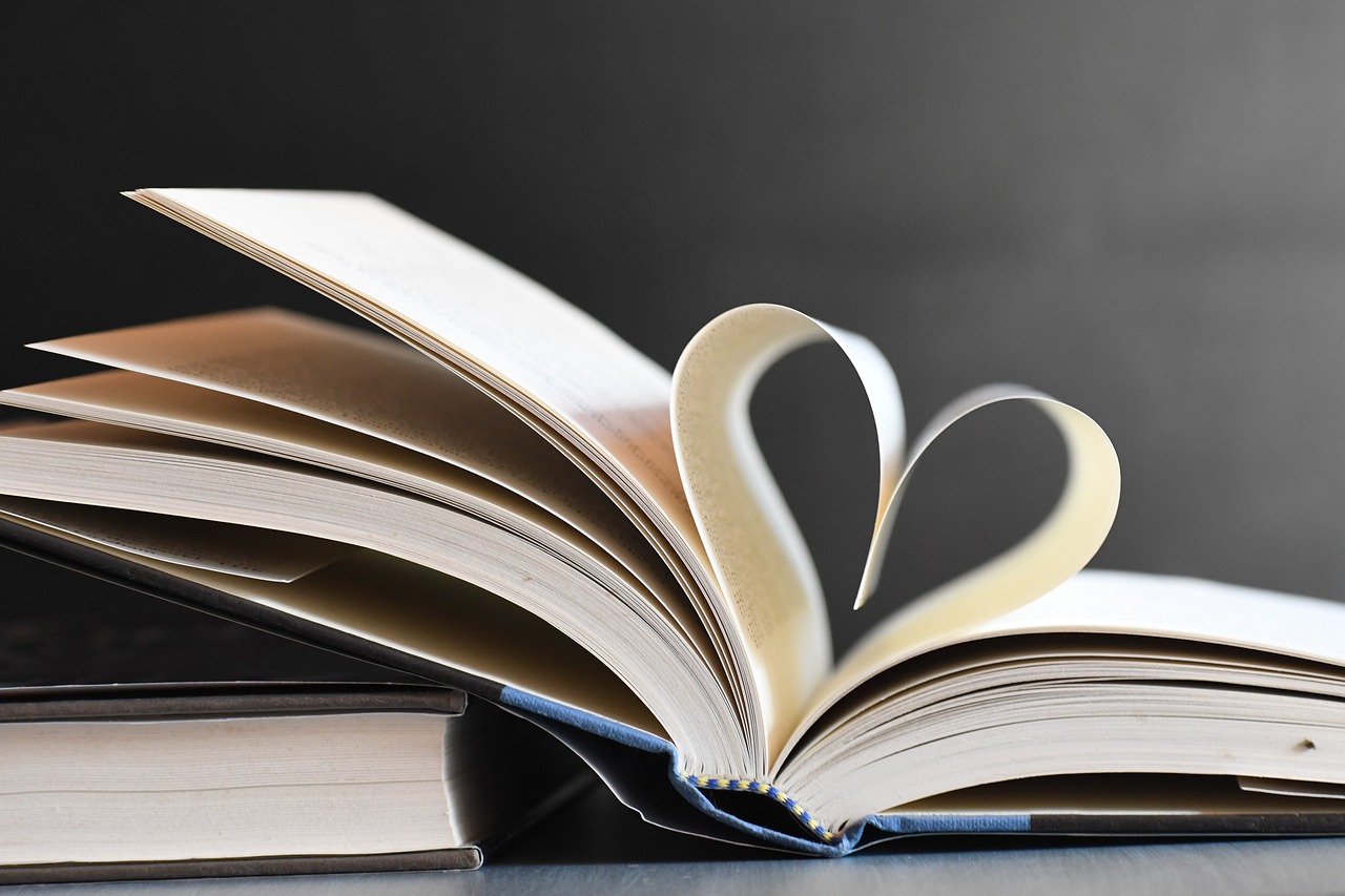 book with pages folded into heart