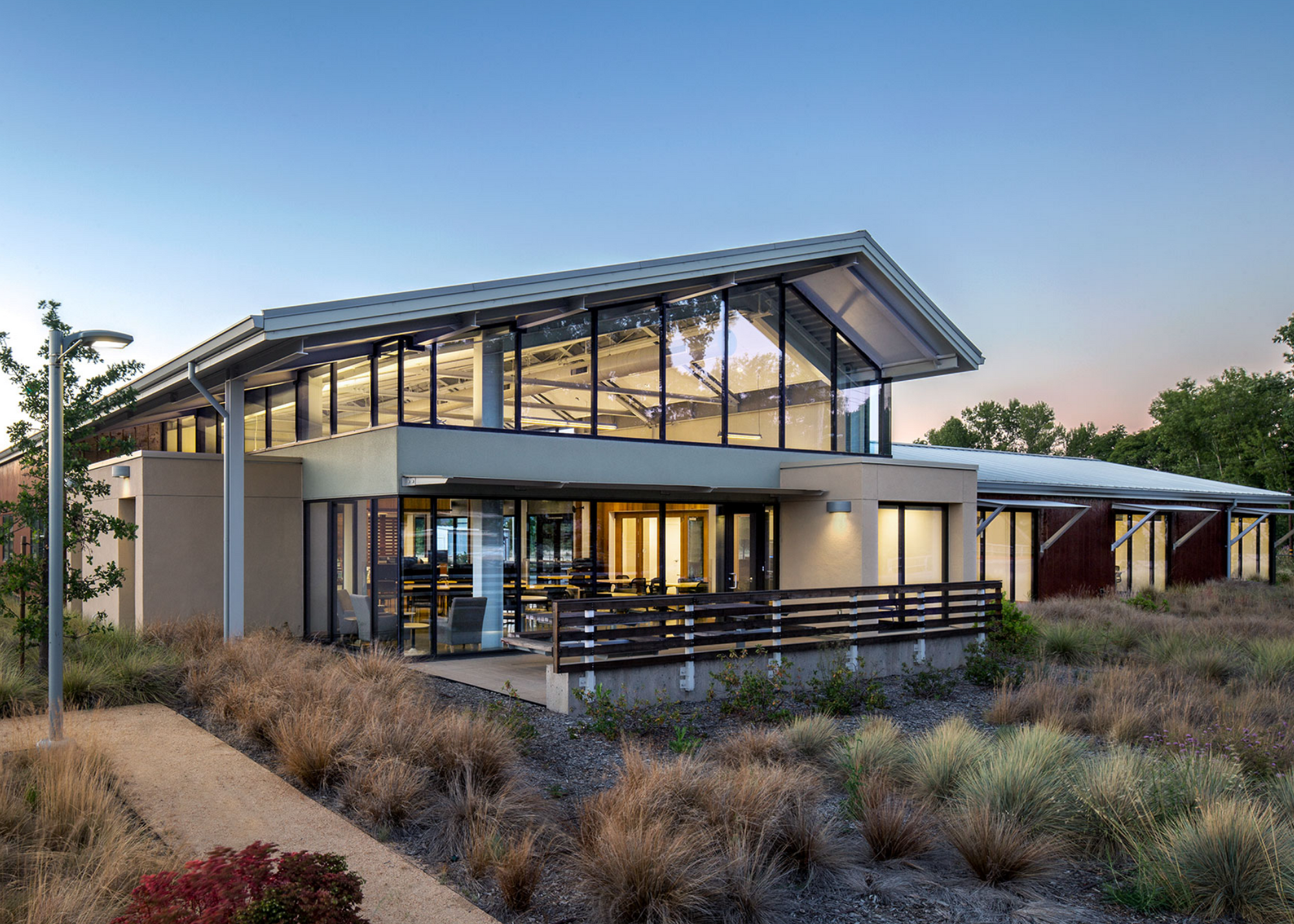 Modern Building with peaked roof.