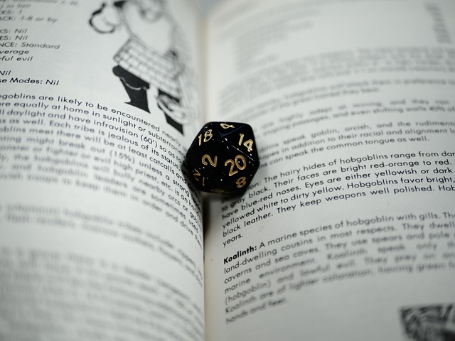 Image of multi-sided dice and open book